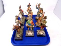 A tray containing eight Italian figures of soldiers on carrara marble bases