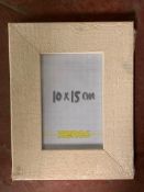 Eighteen Xenos white-washed rustic wooden photo frames, 10 cm x 15 cm,