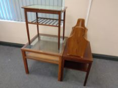 A pine magazine rack together with three 20th century Scandinavian occasional tables