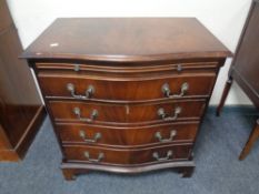 A mahogany Regency style fronted four drawer chest with slide