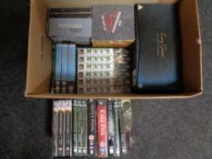 A box containing DVD box sets to include Porridge, Downtown Abbey,