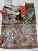 Two boxes containing miscellanea to include assorted glass ware, domino's, ice skates,