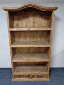 A pine open bookcase