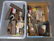 A plastic storage crate together with a cardboard box containing a large quantity of assorted hand