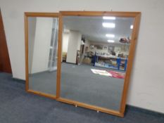 Two contemporary pine framed beveled mirrors