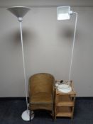 A gold loom armchair together with a wicker stand and two standard lamps