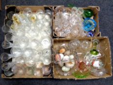Three boxes containing antique and later glass ware including drinking glasses, vases,