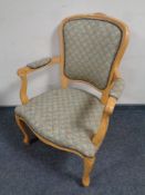 A contemporary salon armchair