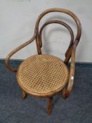 A child's beech bentwood armchair