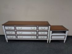 A contemporary nine drawer sideboard together with matching lamp table