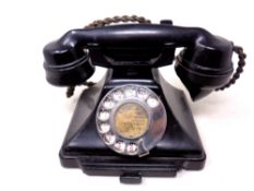 A vintage Bakelite cased telephone