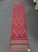 A Meshwani runner 240cm by 57cm