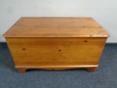 A contemporary pine blanket box