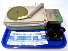A tray containing a mid 20th century Stella portable record player together with a boxed Viewmaster