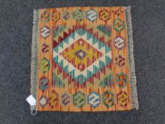 A Chobi kilim 46cm by 52cm