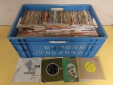 A crate containing a large quantity of vinyl 7