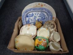 A box containing antique and later ceramics to include 19th century willow patterned meat plates,
