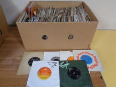 A box containing a large quantity of vinyl 7