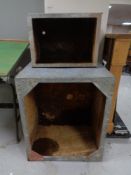 Two galvanised metal water tanks.