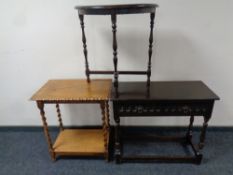 An oak barley twist three-tier occasional table together with a further hall table and a D-shaped