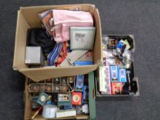 Three boxes containing a quantity of new shop stock to include perfumes, figurines,