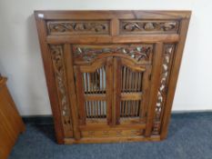 A sheesham wood shutter door mirror