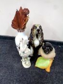 A Royal Dux figure of a parakeet (a/f),