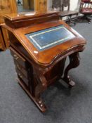 A Victorian style mahogany Davenport
