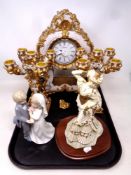 A three-piece Juliana clock garniture together with a Leonardo collection figure, Bride and Groom,
