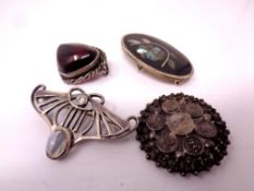 4 vintage silver brooches.