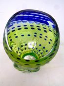 An art glass sculpture in the form of a flower head