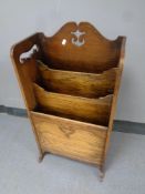 An Edwardian oak magazine stand