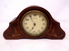 A 19th century inlaid mahogany 8 day mantel clock with Swiss movement