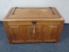 An Arts & Crafts oak coffer