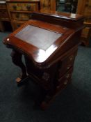 A Victorian style mahogany Davenport