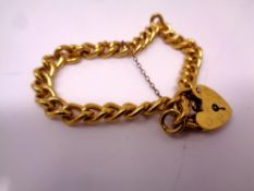 A curb bracelet with pad lock.