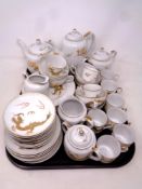 A large Japanese eggshell tea service of dragon design