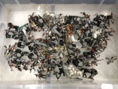 A plastic storage box with lid containing hand painted miniature lead military figures and horses