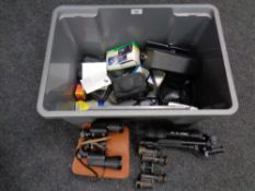 A box of antique and later binoculars,