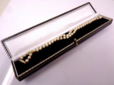 A cultured pearl necklace with 9ct gold clasp.