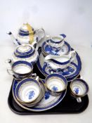 A tray of twenty-two pieces of Booths Real Old Willow tea and dinner china