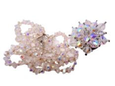 A crystal necklace and brooch