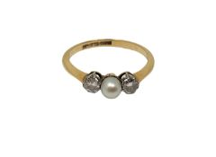 An 18ct gold pearl and diamond ring, size P. CONDITION REPORT: 2.4g.