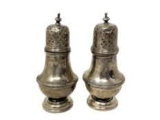 Two silver castors