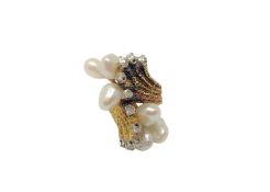 An 18ct gold pearl and diamond abstract ring, size G CONDITION REPORT: 14.