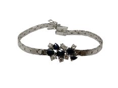An 18ct white gold sapphire and diamond bracelet, approximately 1ct of diamonds, length 17.5cm.