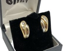 A pair of 18ct yellow and white gold diamond set earrings CONDITION REPORT: 7.