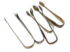 Five pairs of Georgian/Victorian silver sugar tongs (5) CONDITION REPORT: 219.
