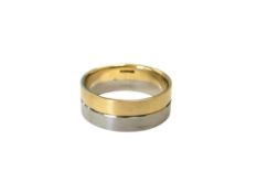 An 18ct yellow gold and palladium 950 wedding band, size W/X. 10.4g.