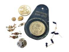 A quantity of dress studs, charms,